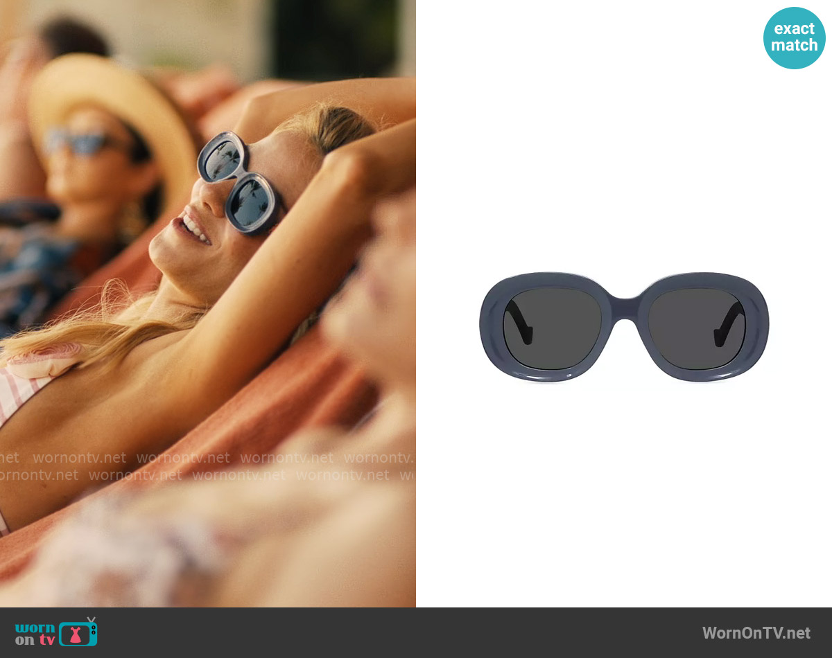 Loewe Chunky Anagram 49mm Oval Sunglasses in Shiny Violet Smoke worn by Jaclyn Lemon (Michelle Monaghan) on The White Lotus