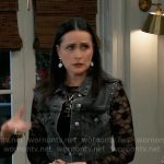 Lois’s studded denim vest and clock earrings on General Hospital