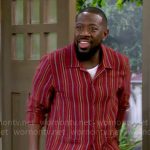 Malcolm’s red striped shirt on The Neighborhood