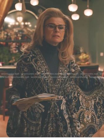 Marilyn’s navy print kaftan dress on Elsbeth