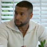 Martin’s white zip neck sweater on Beyond the Gates