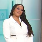 Maya Christian’s white cutout blazer on Sherri