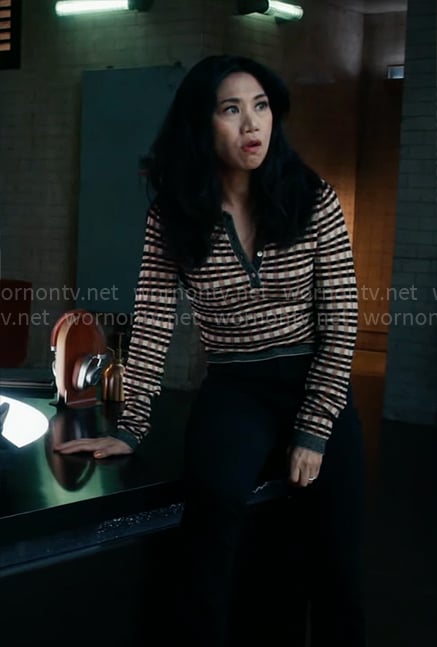Mel’s brown checked sweater on The Equalizer