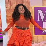 Michelle Buteau’s orange mesh top and asymmetric skirt on Today