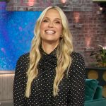 Molly Sims’s black polka dot print tie neck blouse and skirt on The Kelly Clarkson Show