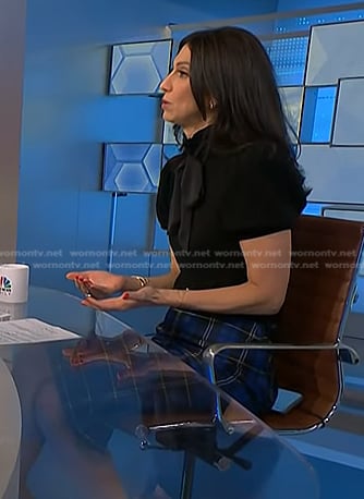 Dr. Natalie Azar’s black tie neck top and blue plaid skirt on NBC News Daily