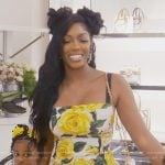 Porsha’s yellow rose print sleeveless dress on The Real Housewives of Atlanta