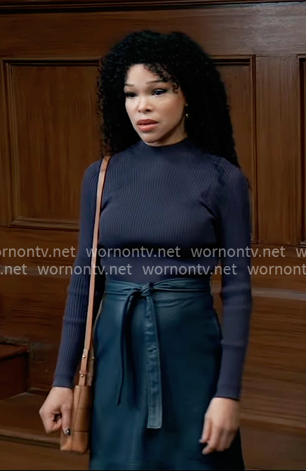 Portia’s blue rib knit top and leather skirt on General Hospital