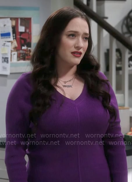 Riley’s purple v-neck sweater on Shifting Gears