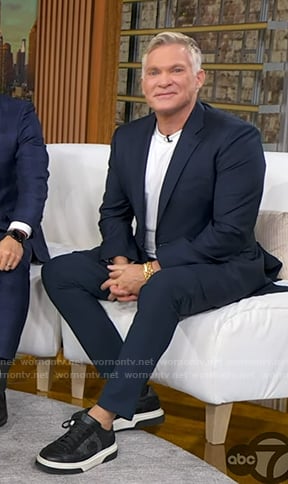Sam Champion’s black sneakers on Good Morning America