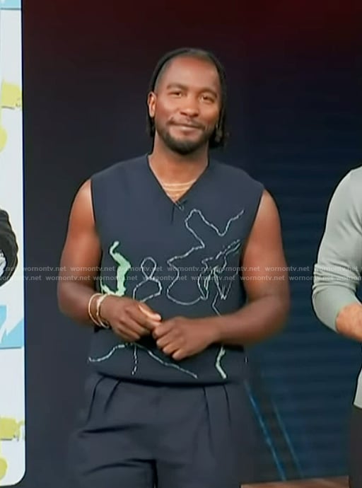 Scott’s blue abstract vest on Access Hollywood