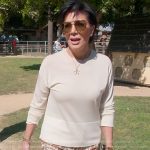 Kris’s snake skin print pants on The Kardashians