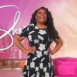 Sherri’s black floral print fit and flare dress on Sherri