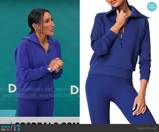 Spanx AirEssentials Half Zip Sweatshirt in Deep Azure worn by Elizabeth Werner on CBS Mornings
