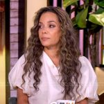 Sunny’s white puff sleeve top and tulle skirt on The View