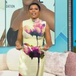 Tamron’s floral print ribbed top and satin skirt on Tamron Hall Show