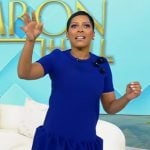 Tamron’s blue ruffle mini dress on Tamron Hall Show