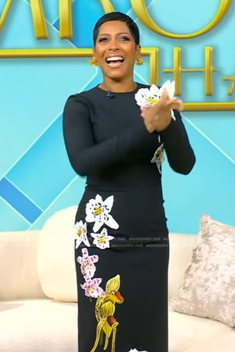 Tamron’s black floral embroidered dress on Tamron Hall Show