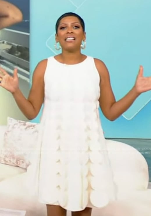Tamron’s white scallop trim mini dress on Tamron Hall Show