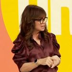 Valerie Bertinelli’s burgundy puff sleeve top on The Drew Barrymore Show