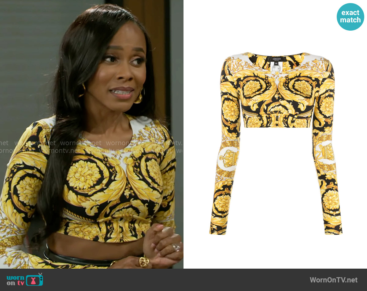 Versace Barocco-print crop top worn by Hayley Lawson (Marquita Goings) on Beyond the Gates