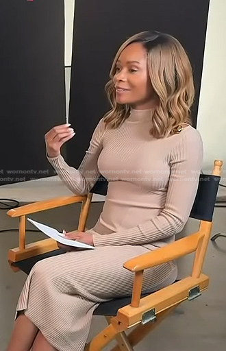 Zuri’s beige knit dress on Access Hollywood