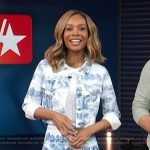 Zuri’s blue floral print denim jacket and mini skirt on Access Hollywood