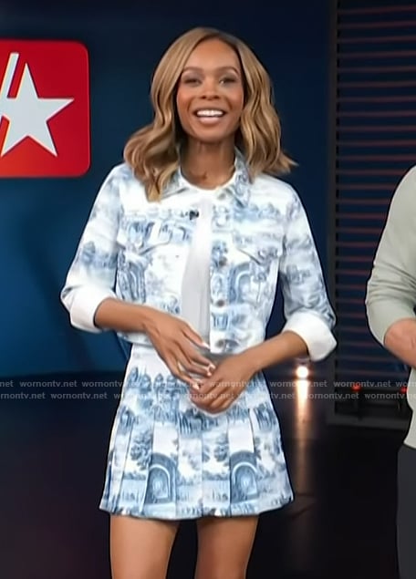 Zuri’s blue floral print denim jacket and mini skirt on Access Hollywood