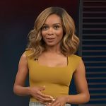 Zuri’s plaid mini skirt and bodysuit on Access Hollywood