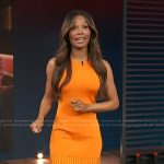 Zuri’s orange sleeveless fringe dress on Access Hollywood