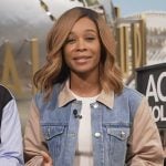 Zuri’s colorblock mixed media coat on Access Hollywood