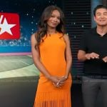 Zuri's orange sleeveless fringe dress on Access Hollywood