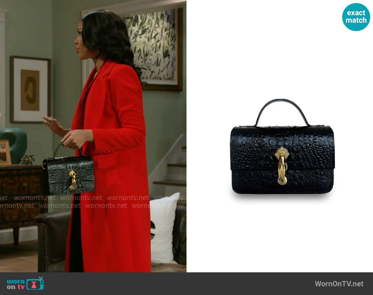 Indigolush Midi Classic Gl Black Bag worn by Dani Dupree (Karla Mosley) on Beyond the Gates