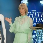 Alex Bovaird’s green sheer blouse and skirt on Access Hollywood
