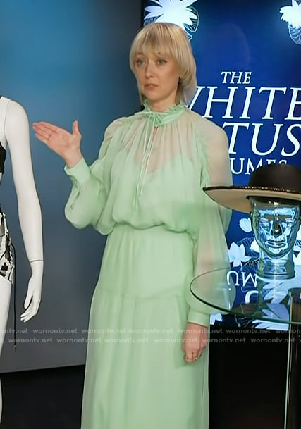 Alex Bovaird’s green sheer blouse and skirt on Access Hollywood