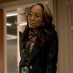 Amanda’s floral blouse, black pinstripe blazer and green triangle belt on Will Trent