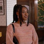 Amina’s orange knit sweater and blue bubble skirt on All American