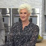 Anne Burrell’s black floral tie neck blouse on Today