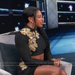 Bianca Belair’s black embellished crop top and skirt on Access Hollywood