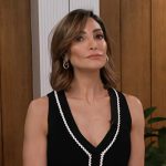 Courtney’s black contrast knit top on Access Hollywood