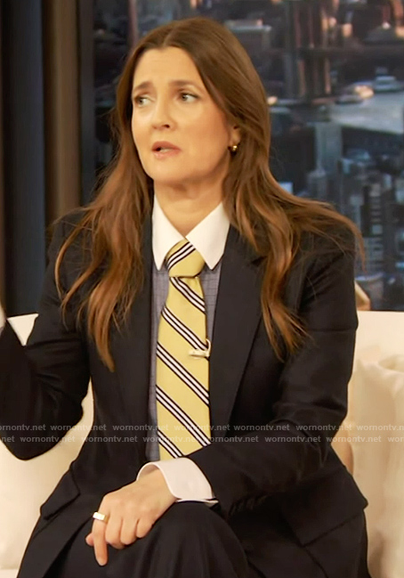 Drew’s navy blazer and striped tie on The Drew Barrymore Show