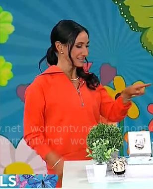 Elizabeth Werner’s red leggings and sweatshirt on CBS Mornings
