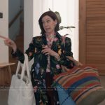 Elsbeth’s black floral print coat on Elsbeth