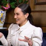 Emily Curl’s white leather puff sleeve jacket on E! News
