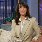 Jennifer Beals’ taupe blazer and plaid skirt on The Kelly Clarkson Show