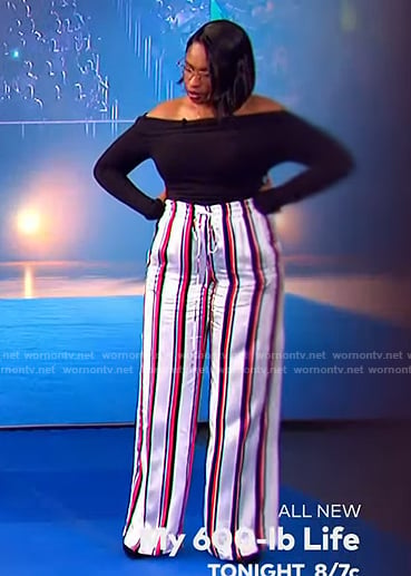 Jennifer’s white striped pants and off shoulder top on The Jennifer Hudson Show