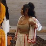 Kelli’s white stripe trim top and pants on The Real Housewives of Atlanta