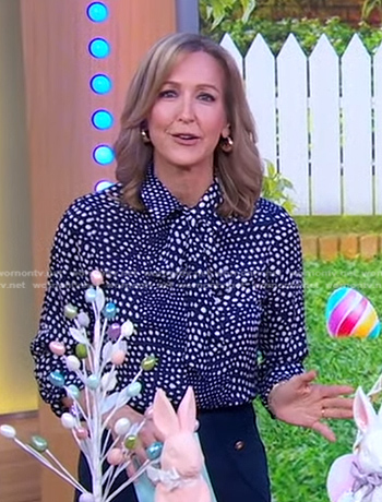 Lara’s navy polka dot tie neck blouse on Good Morning America