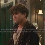 Lucas Adams’s grey henley shirt and black jacket on Greys Anatomy