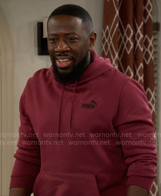 Malcolm’s red Puma hoodie on The Neighborhood